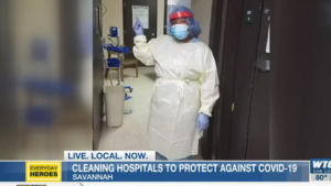 Candler Hospital EVS worker in PPE cleaning room